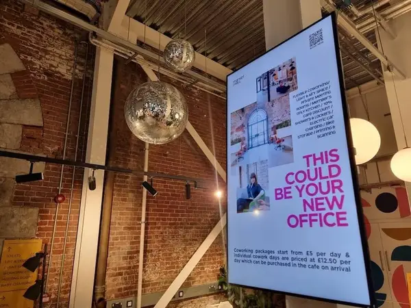 Coworking Space Signage: Why Flexible Branding Wall Graphics Beat Fixed Signs Every Time