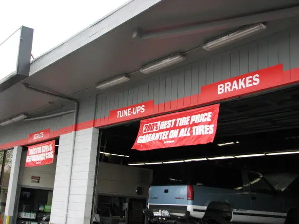 Auto Dealership Service Bay Signage: The Engineering Secrets Most Contractors Miss (And Why Your Sign Dies in 3 Years)