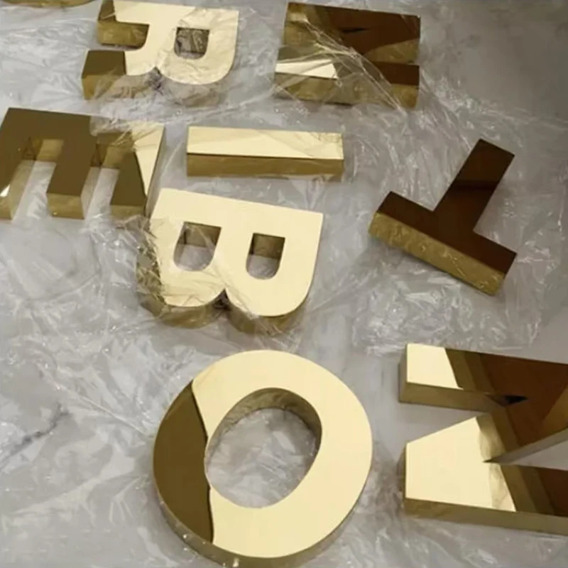 Gold channel letters with gold trim and warm white LED face