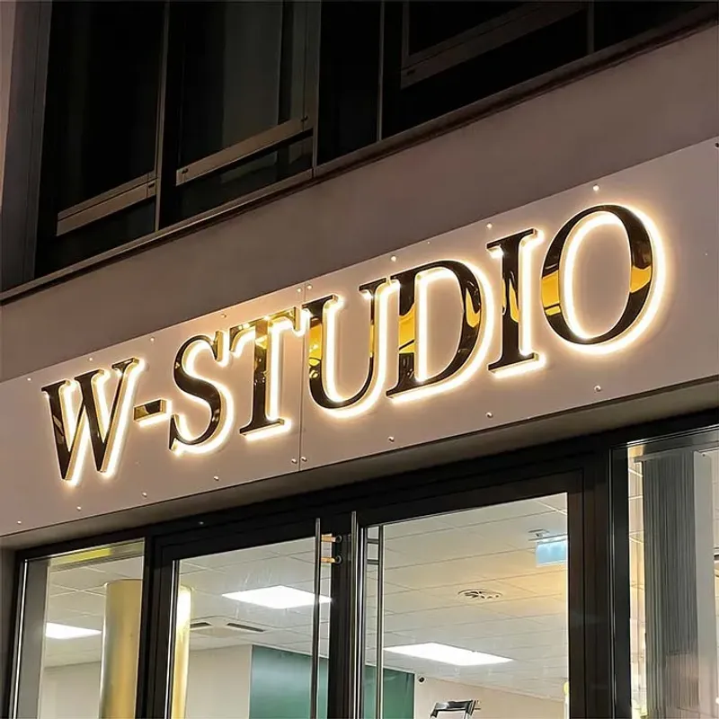 Bar channel letters gold trim warm glow sign