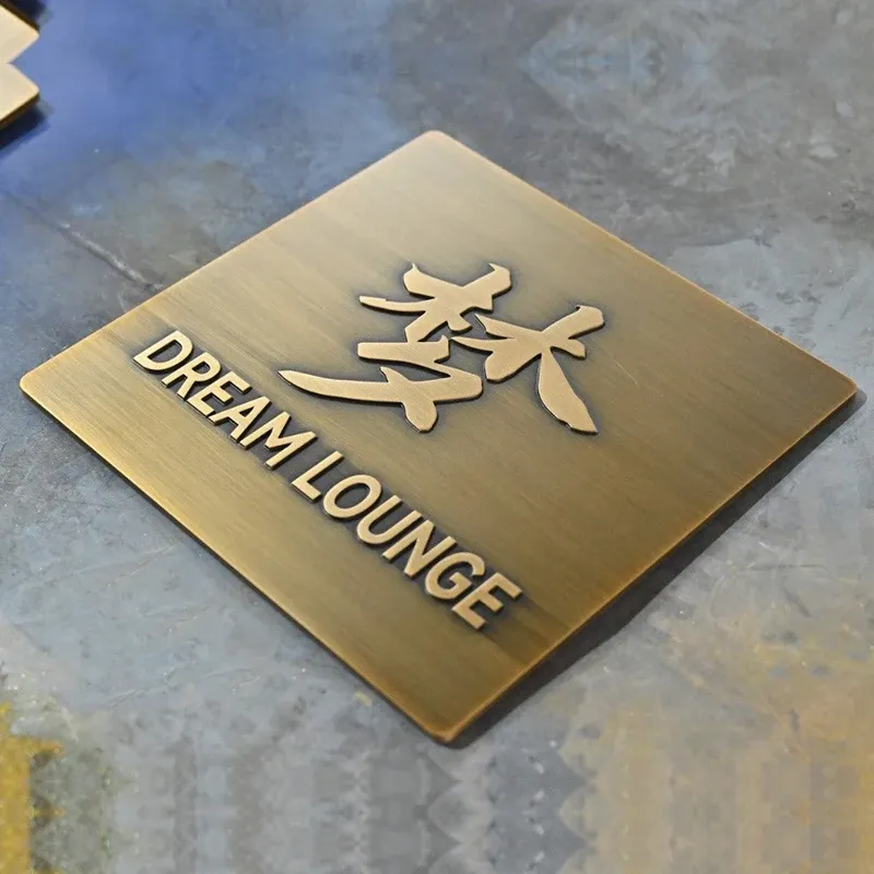 Embossed metal sign