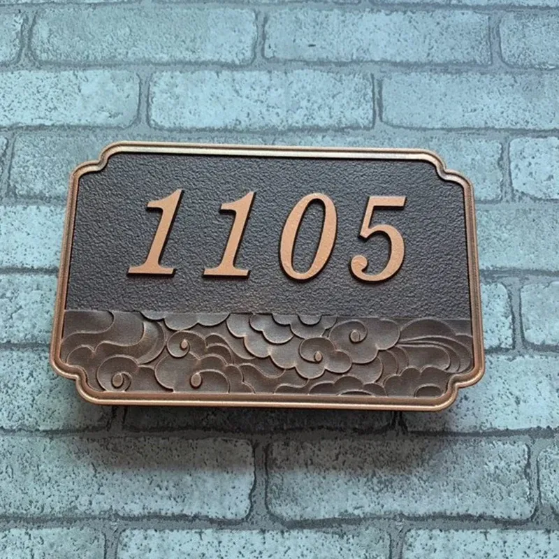Bronze and aluminum relief sign